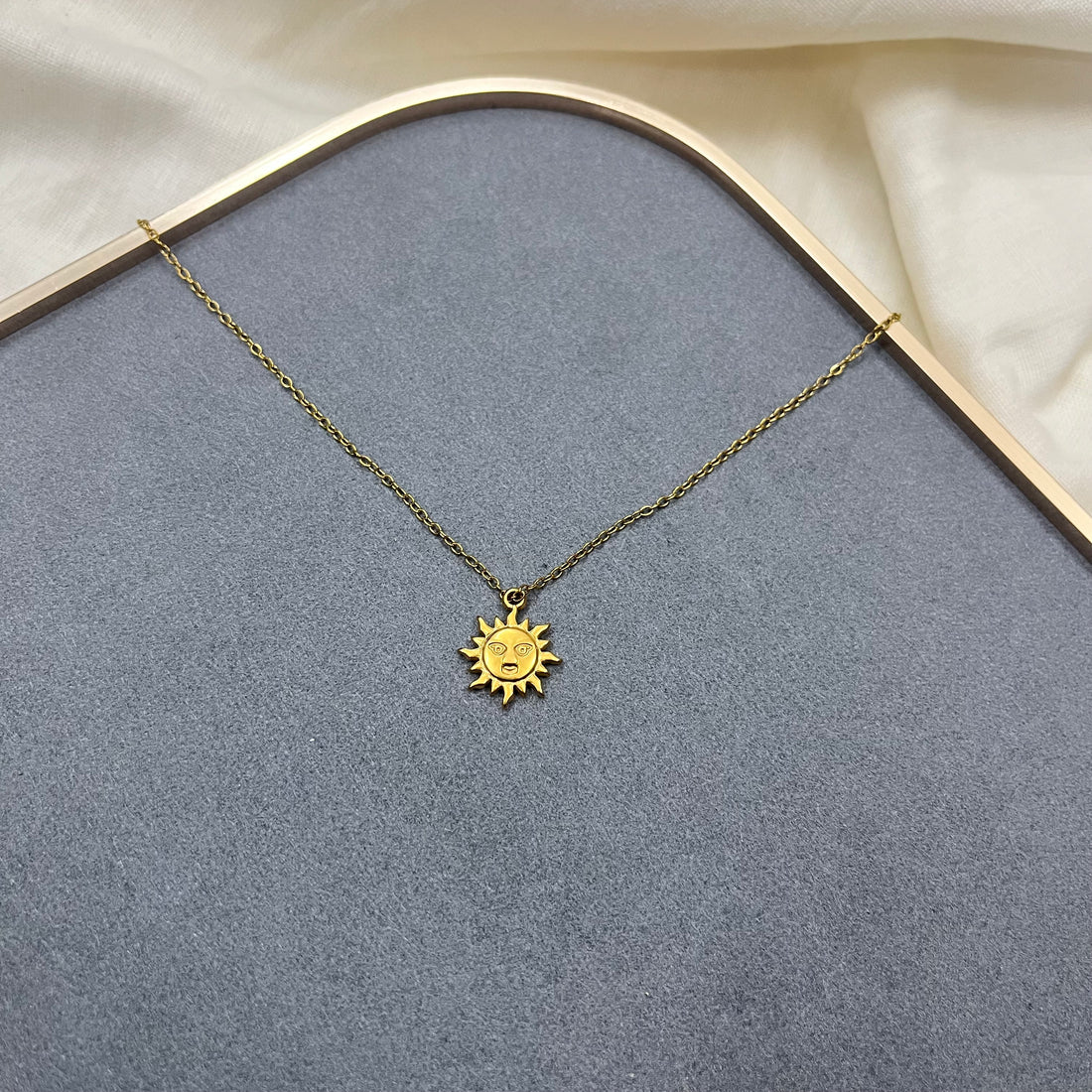 SUN CHARM NECKLACE