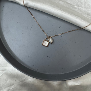 LOCK WITH PEARL DROP NECKLACE
