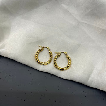 WAVY LARGE CIRCLE HOOPS