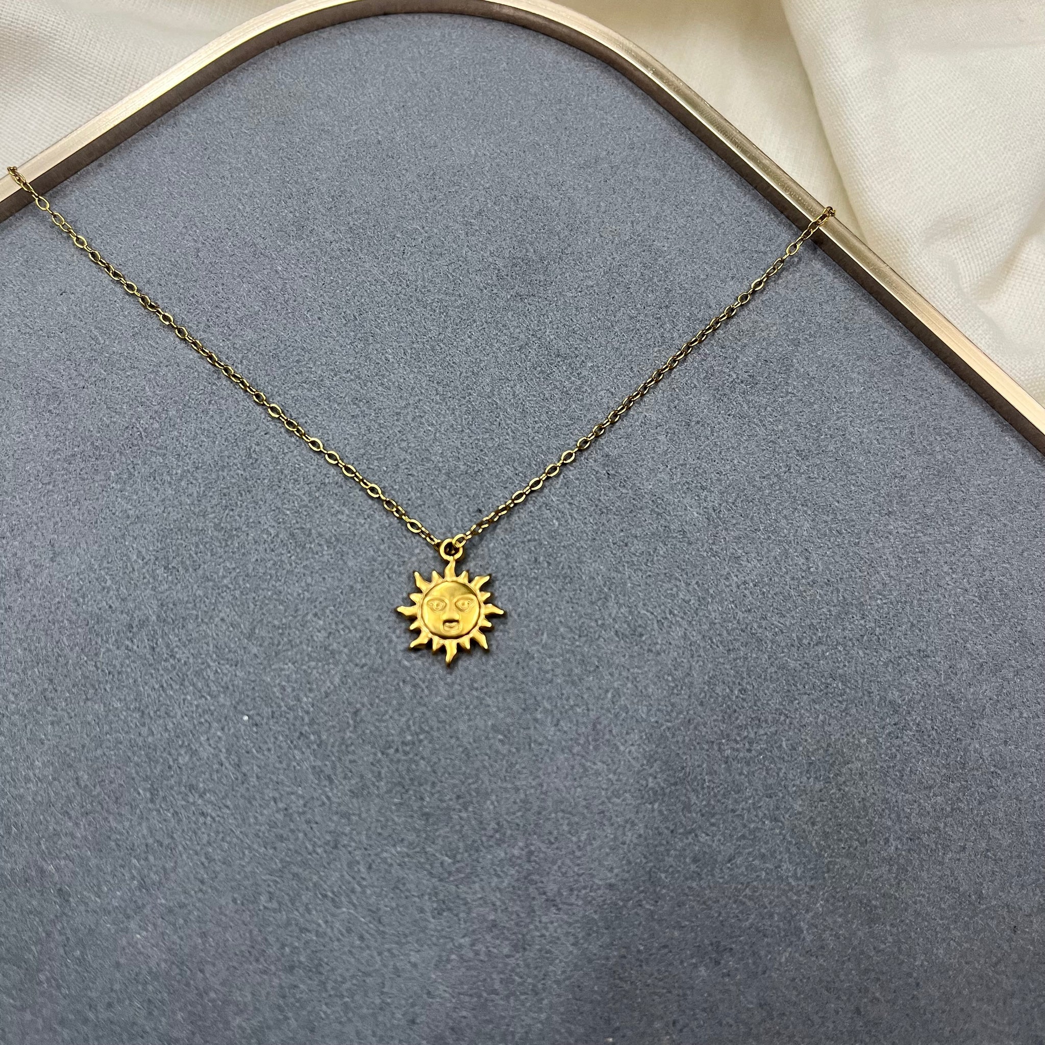 SUN CHARM NECKLACE