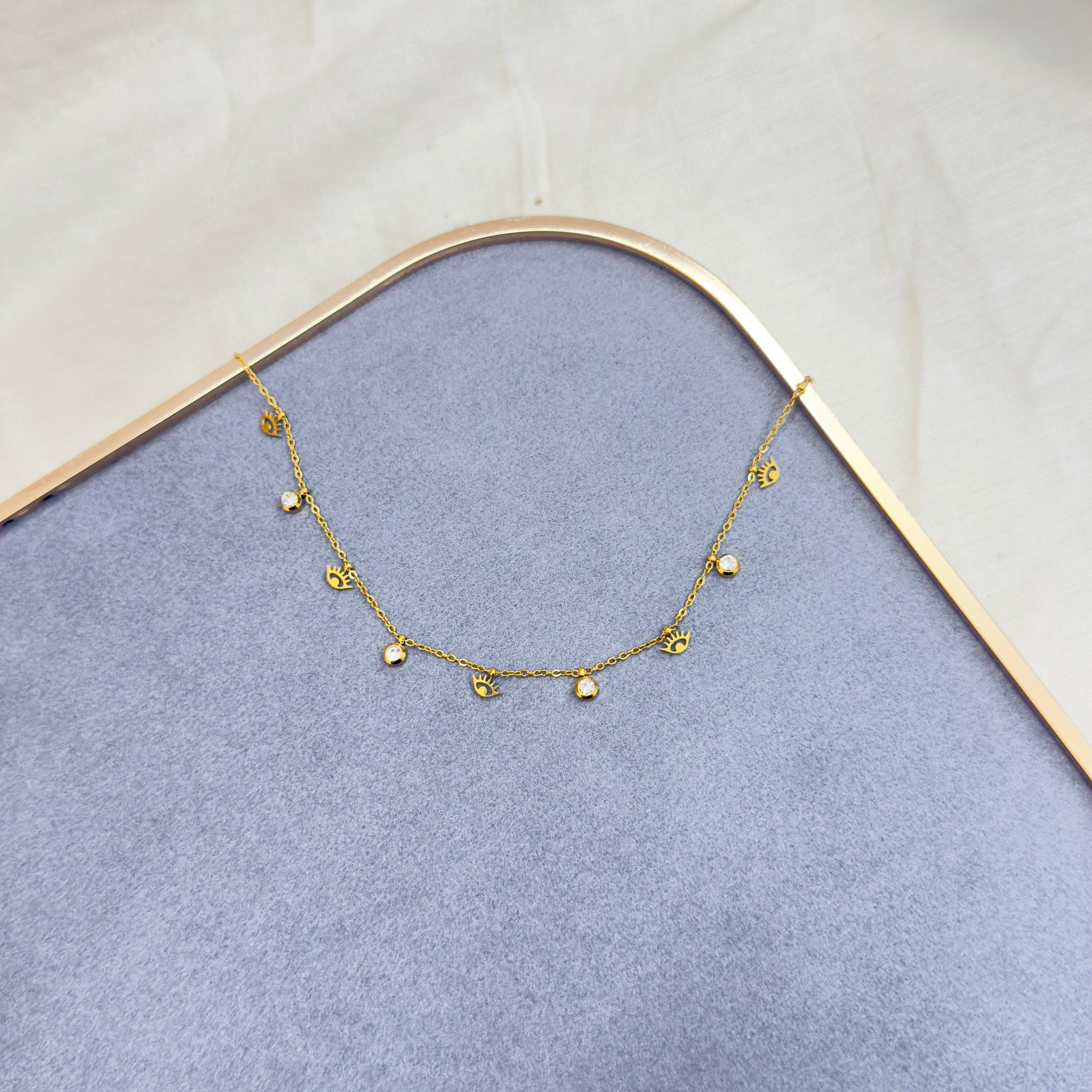 EVIL EYE AND CRYSTAL CHARM NECKLACE